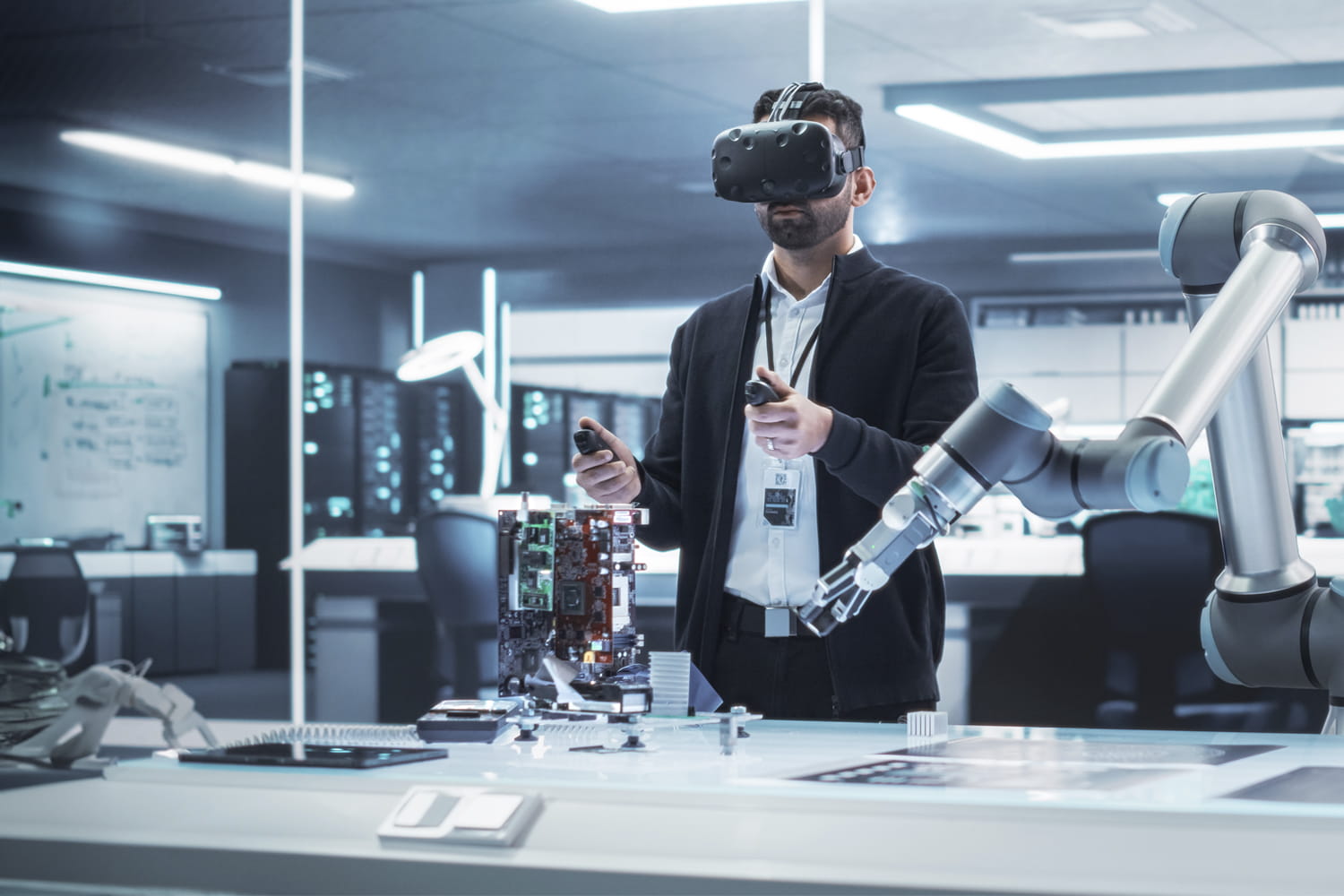 Engineer uses VR equipment to control robot