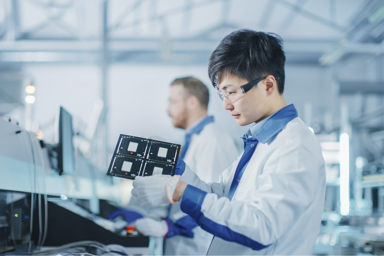 Engineers inspecting electrical components