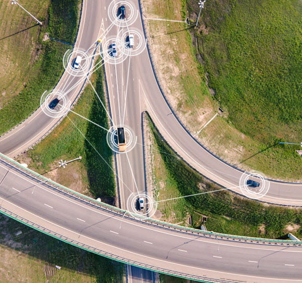 Intelligent Vehicles Cars Communicating Ai Logistic. Autonomous Smart Roads Traffic Road Junction Interchange Motorway Triangulation Of Traffic Data